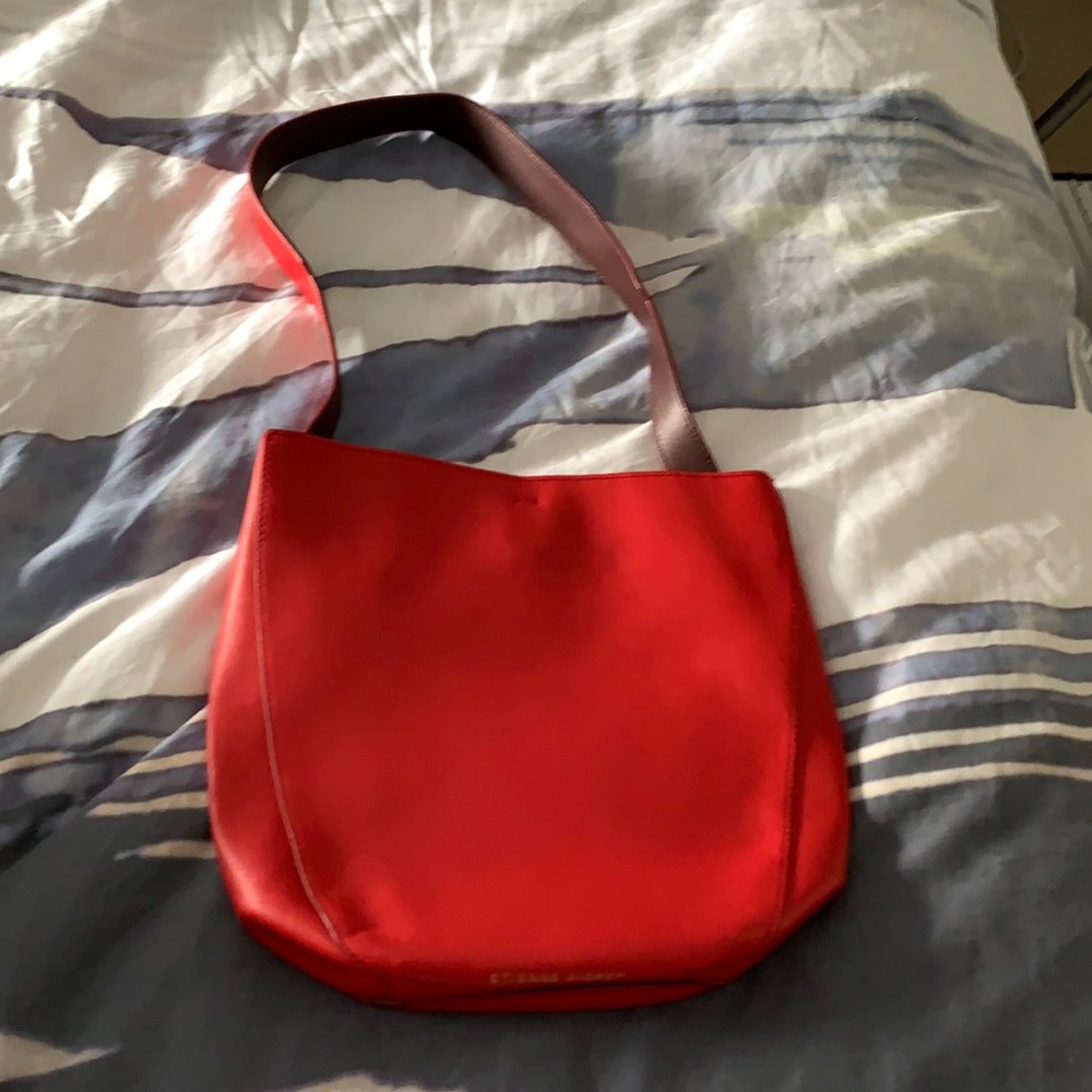Red designer shoulder bag Never worn. Good as new!